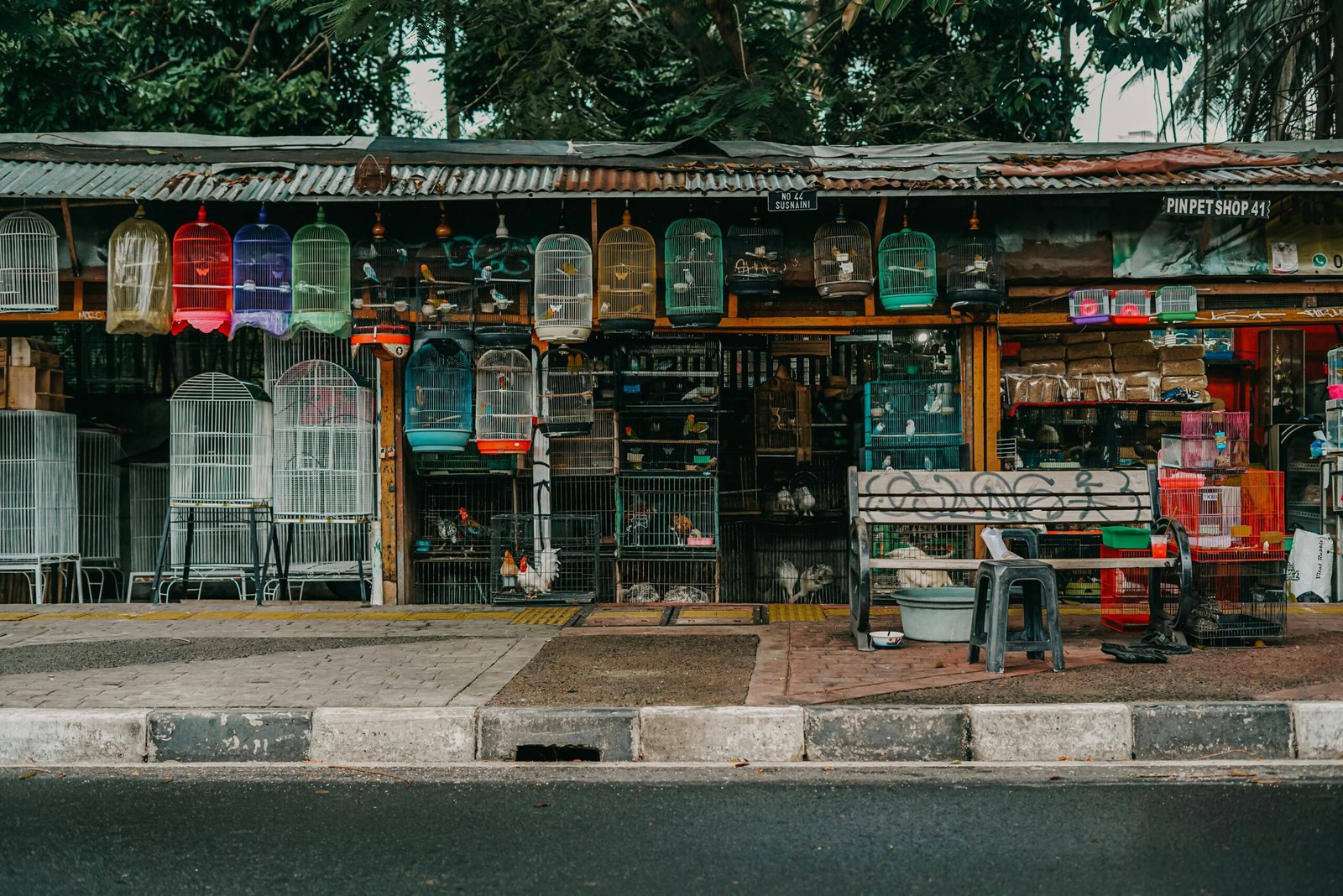 a store front with a table and chairs